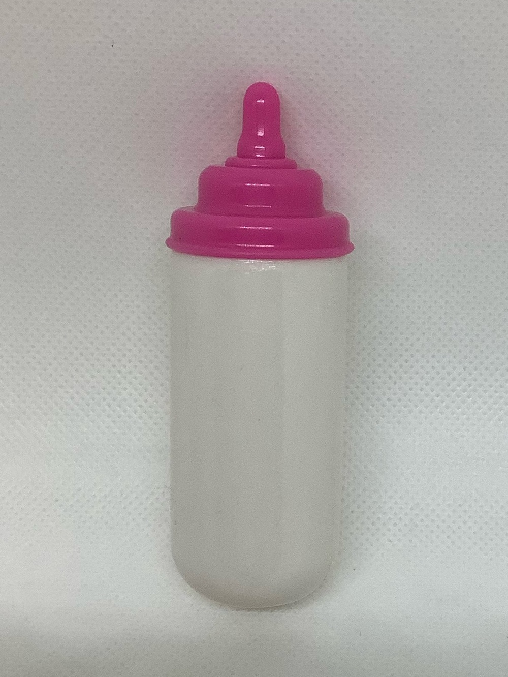 Unbranded White and Pink Plastic Baby Doll Bottle Toy